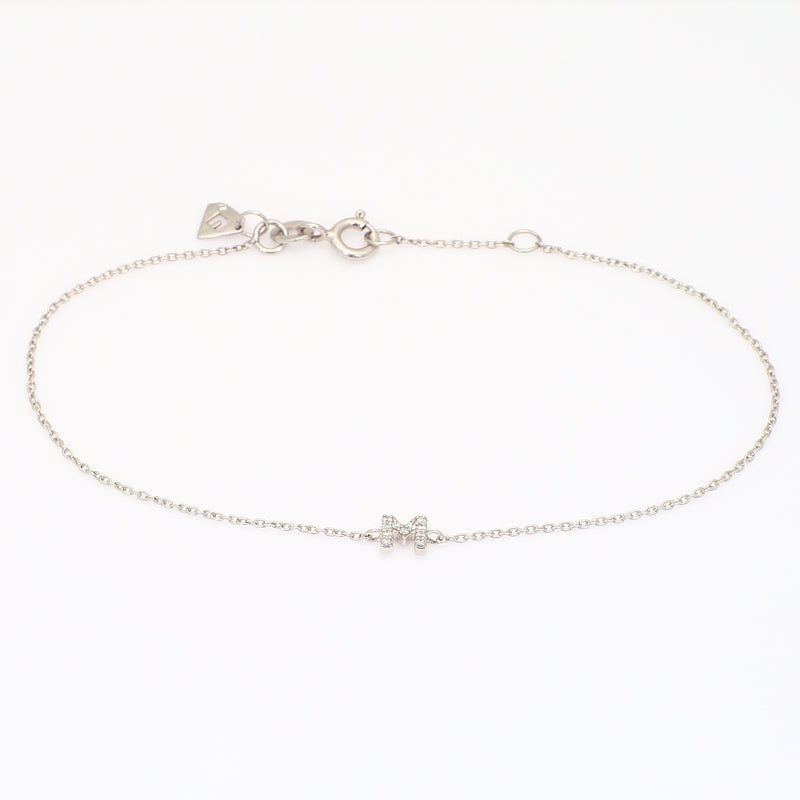 Lexicon white diamond white gold initial bracelet